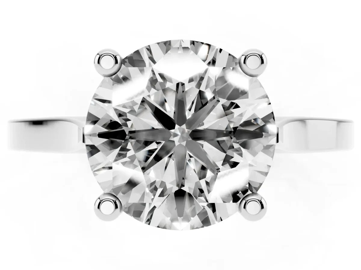 Round Cut Solitaire Diamond Ring with Four-Prong Setting and Tapered Band Platinum