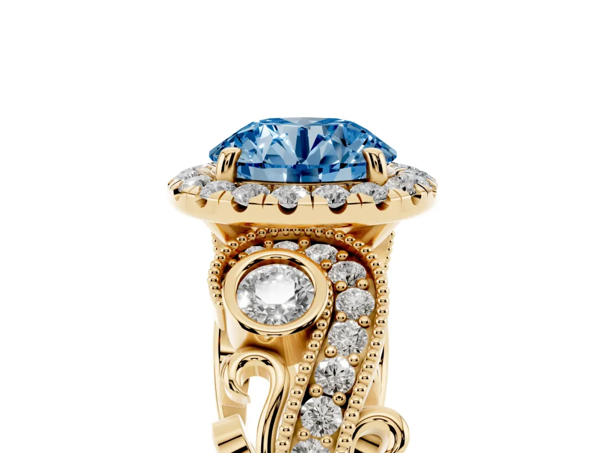 Fancy Blue Round Cut Halo Diamond Ring with Milgrain and Bezel Accents on a Split Shank Band Yellow gold