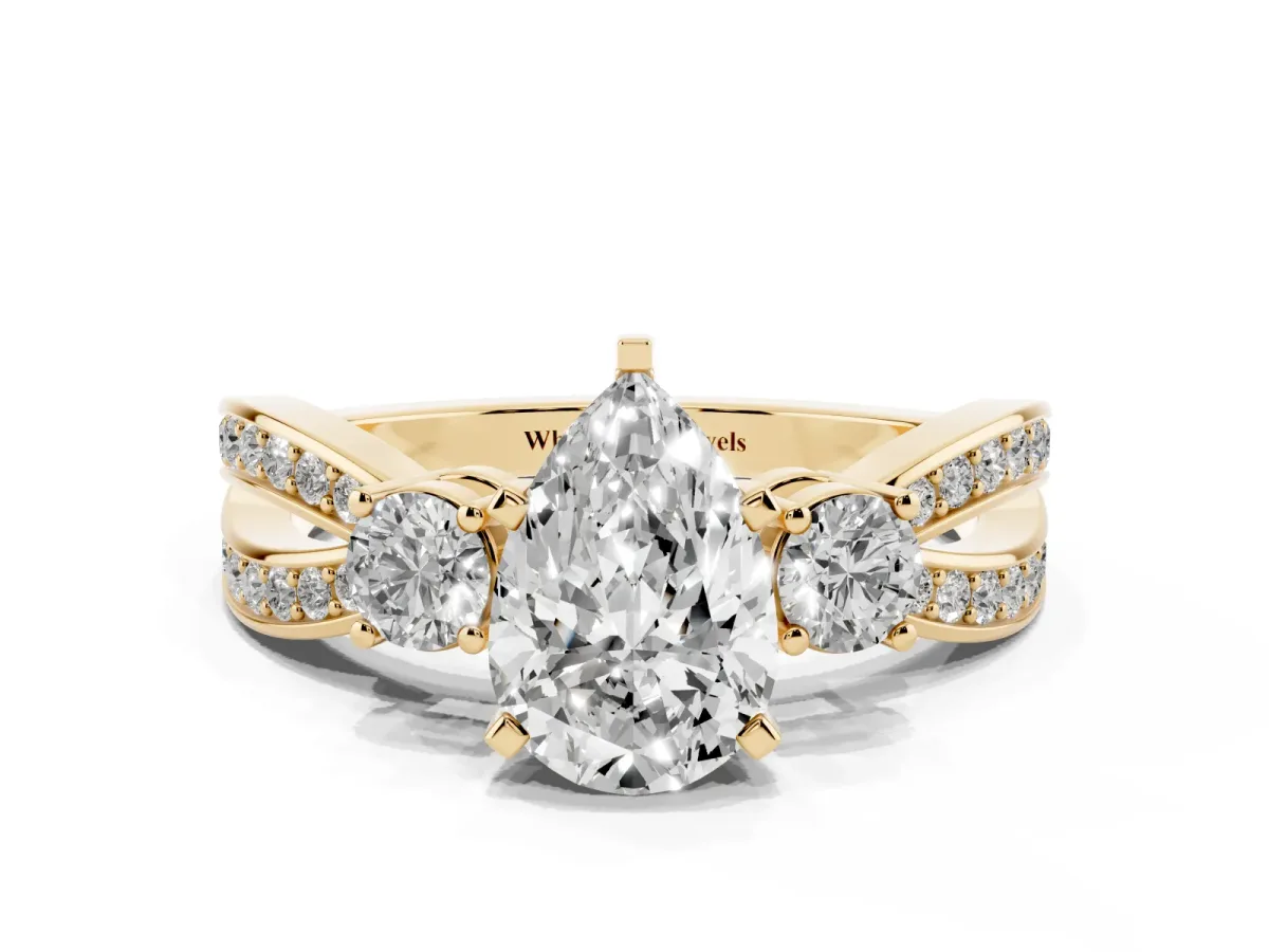 Three-Stone Pear Cut Cut Diamond Twist Band with Prong Setting Yellow gold