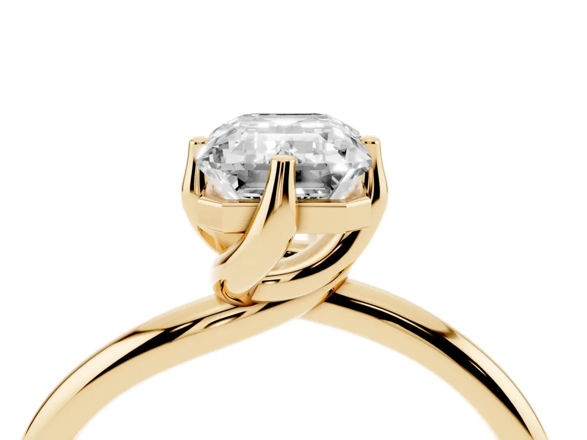 Emerald Cut Diamond Solitaire Engagement Ring with Four-Prong Setting and Classic Band Yellow gold