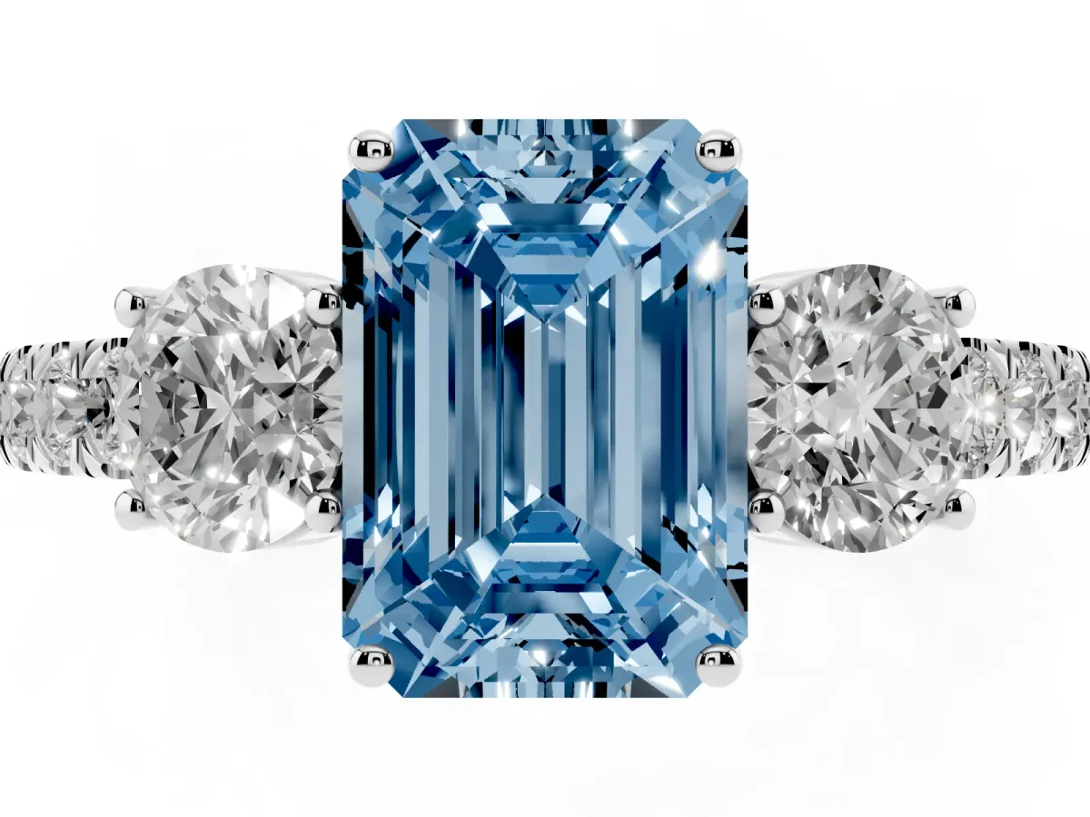Fancy Blue Emerald Cut Cut Diamond Three-Stone Ring with Round Side Stones and Pavé Band Silver