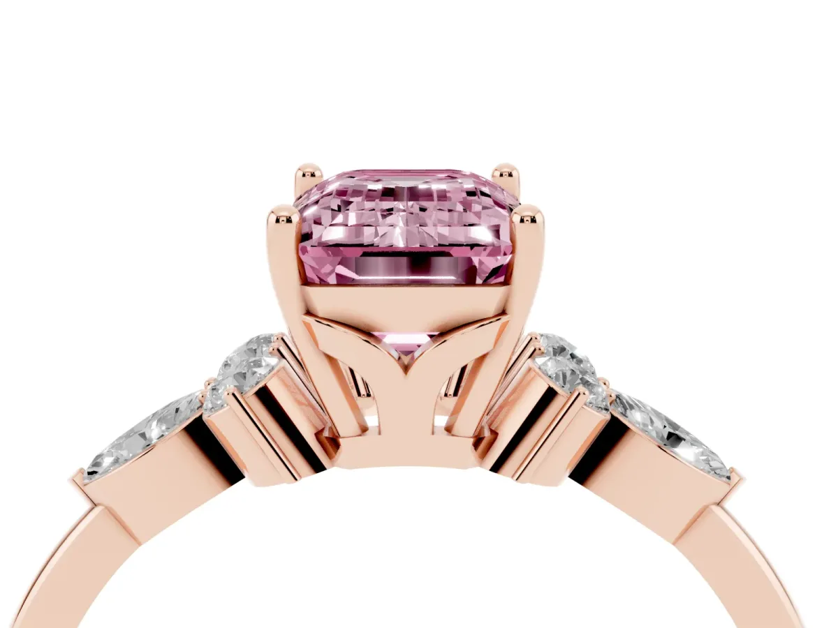 Fancy Pink Emerald Cut Brilliant Diamond Solitaire Ring with Pear Side Stones and Four-Prong Setting Rose gold