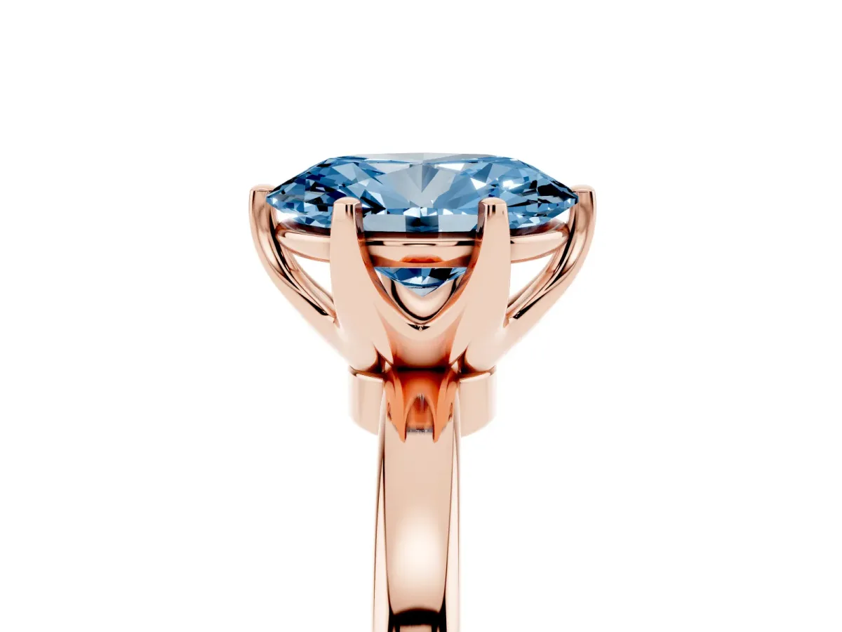 Fancy Blue Oval Cut Solitaire Diamond Ring with Six-Prong Setting on a Classic Band Rose gold
