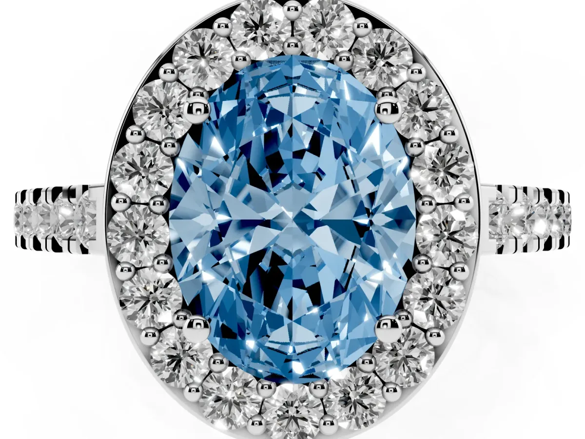 Fancy Blue Oval Cut Diamond Halo Ring with Round Pavé Split Shank and Prong Setting Platinum