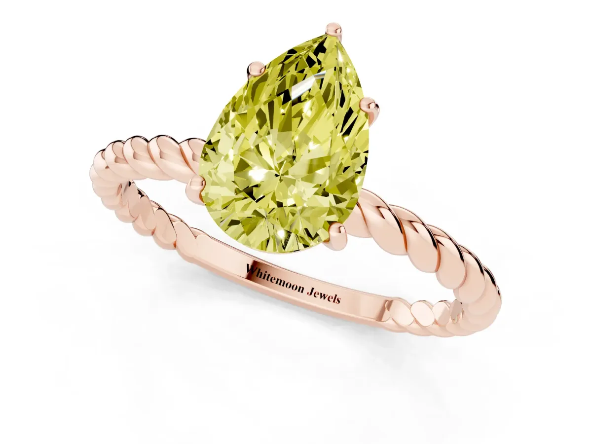Fancy Yellow Pear Cut Solitaire Twist Band Ring with Four-Prong Setting Rose gold