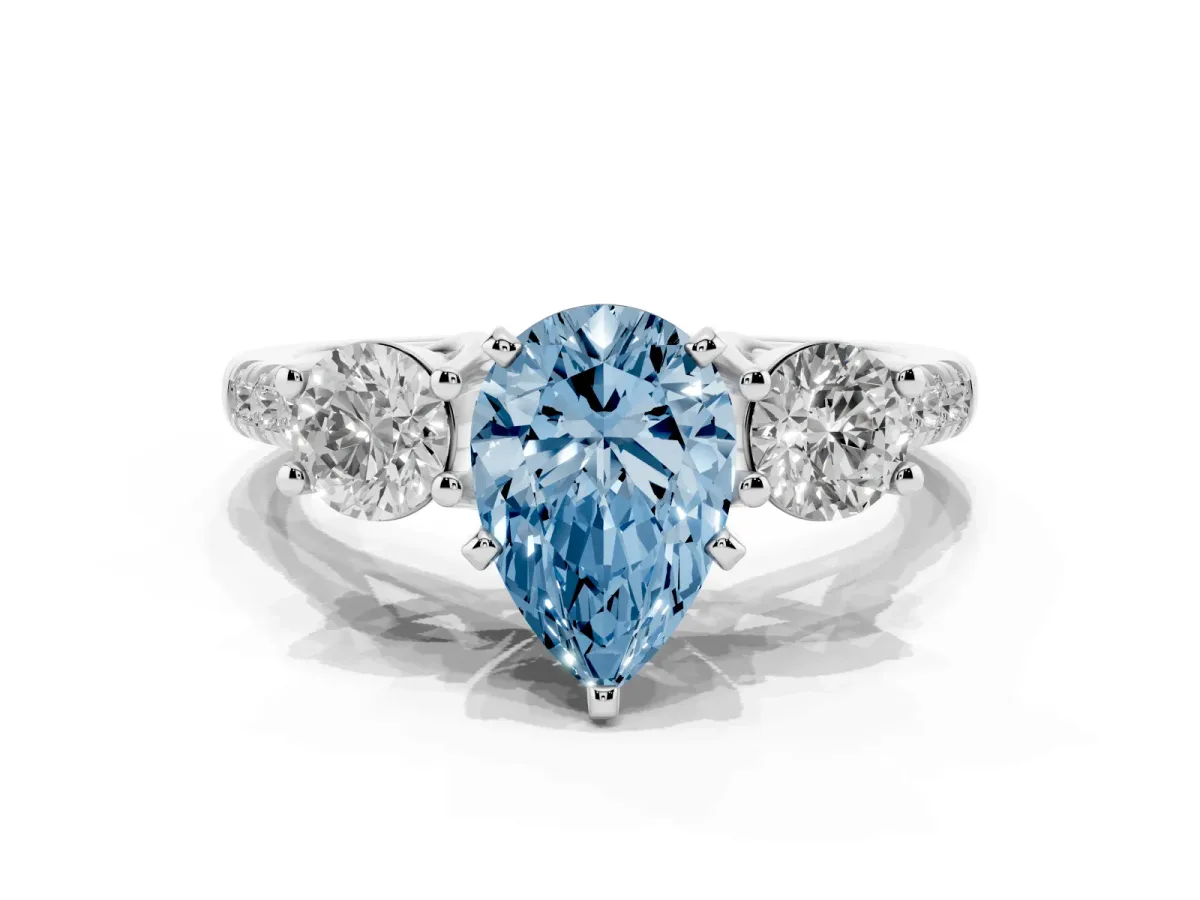 Fancy Blue Three-Stone Pear Cut Diamond Pavé Band with Four-Prong Setting Platinum
