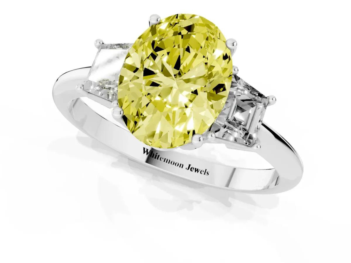 Fancy Yellow Oval Cut Diamond Three-Stone Ring with Trapezoid Side Stones and Prong Setting Platinum