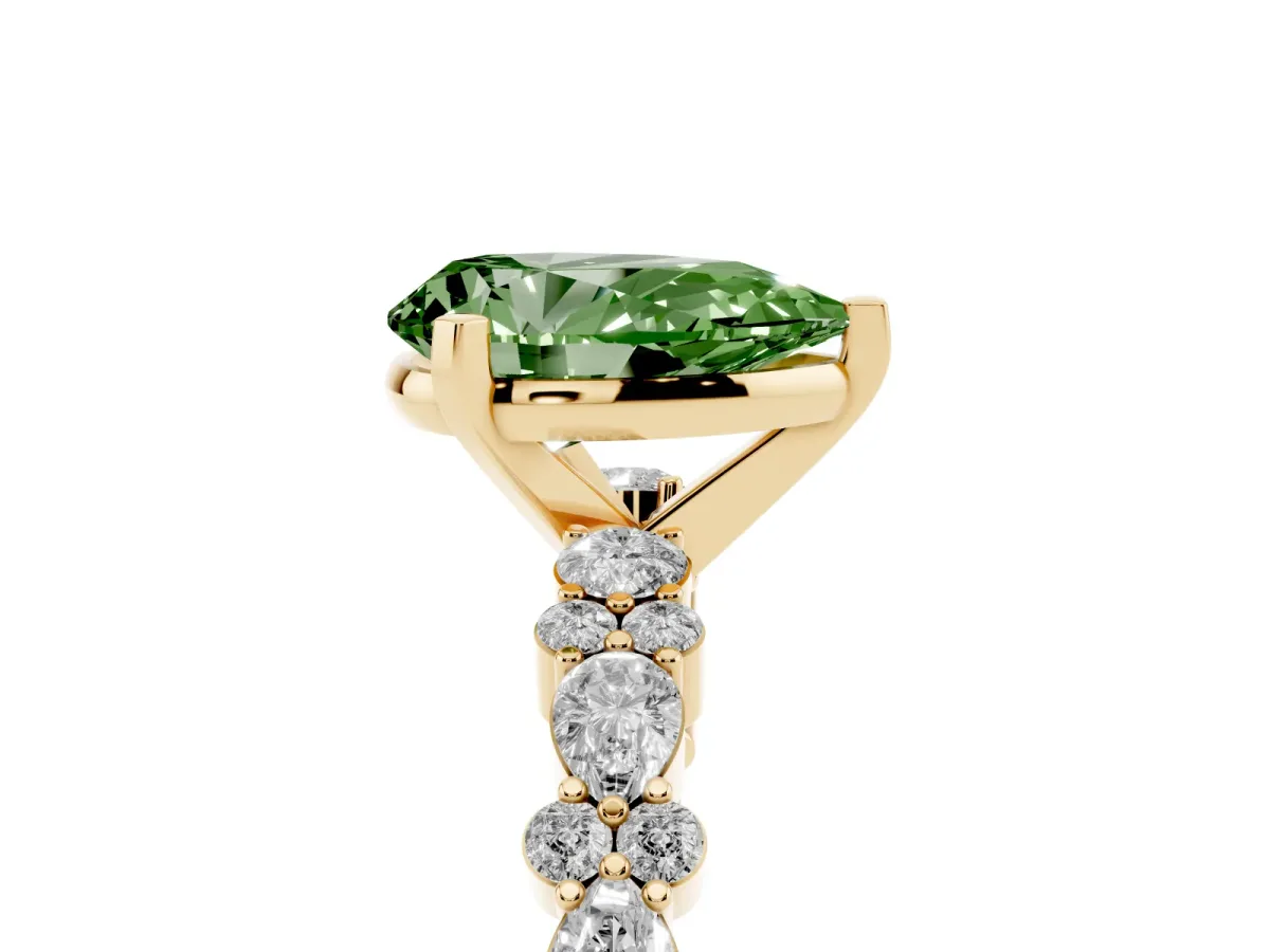 Fancy Green Pear Cut Diamond Side Stone Solitaire Ring with Round and Four-Prong Setting Yellow gold
