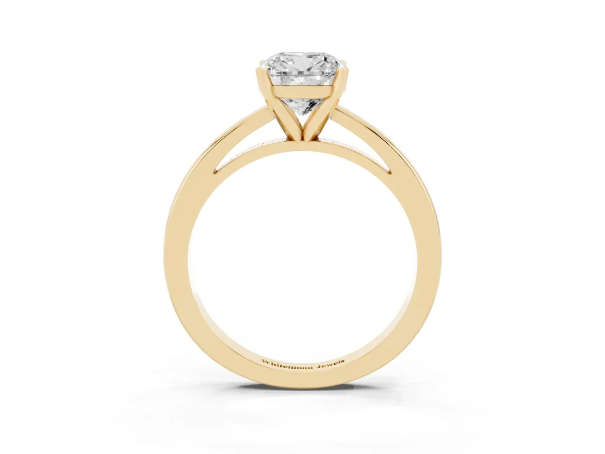 Cushion Cut Solitaire Diamond Engagement Ring with Four-Prong Setting on a Classic Band Yellow gold