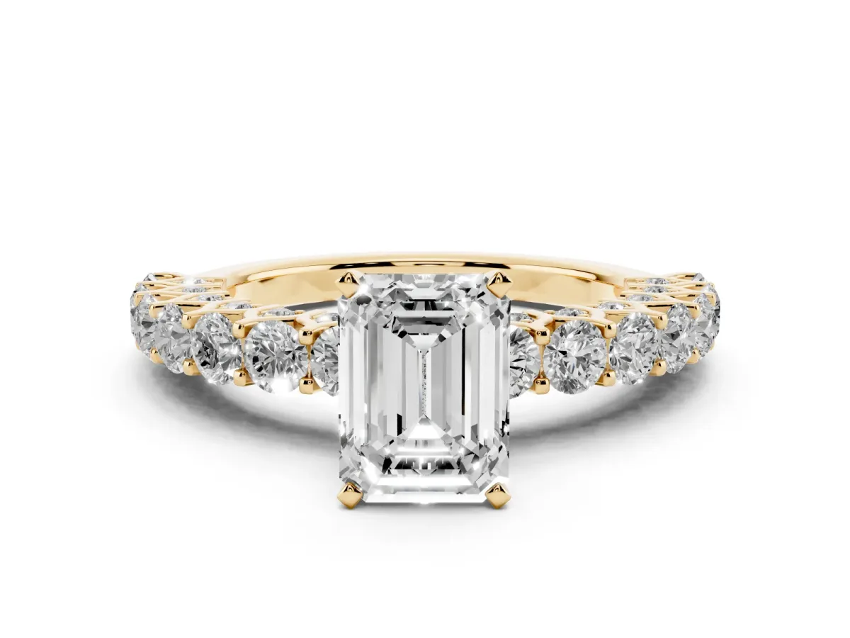 Emerald Cut Diamond Solitaire Ring with Shared Prong Pavé Band and Four-Prong Setting Yellow gold