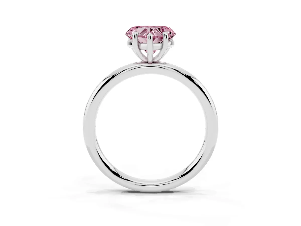 Fancy Pink Heart Cut Solitaire Diamond Ring with Four-Prong Setting on a Plain Band Platinum