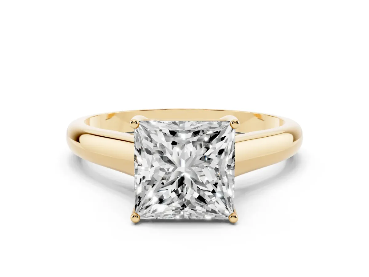 Princess Cut Solitaire Engagement Ring with Tapered Band and Four-Prong Setting Yellow gold
