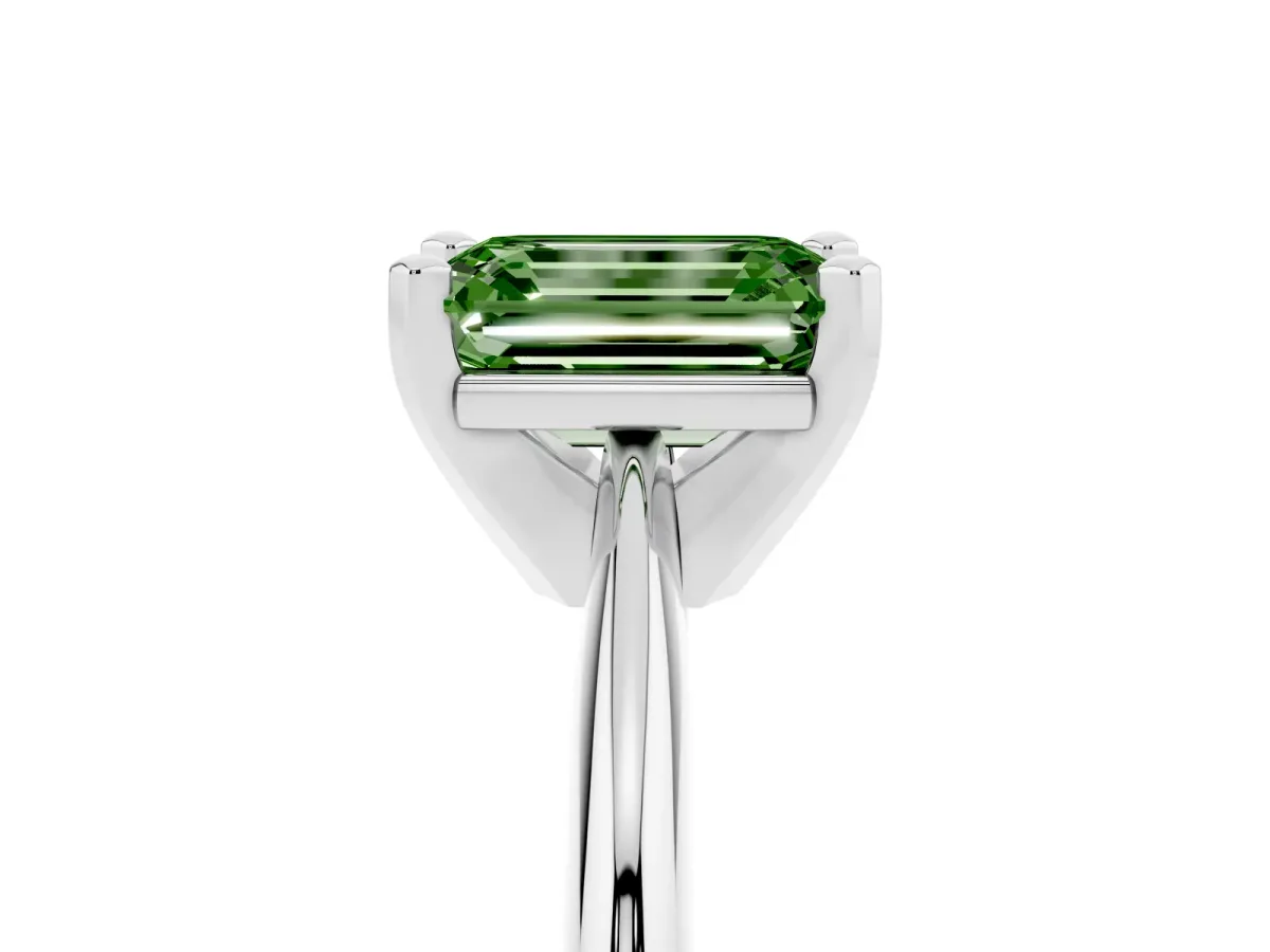 Fancy Green Emerald Cut Cut Solitaire Ring with Four-Prong Setting on a Classic Band Platinum