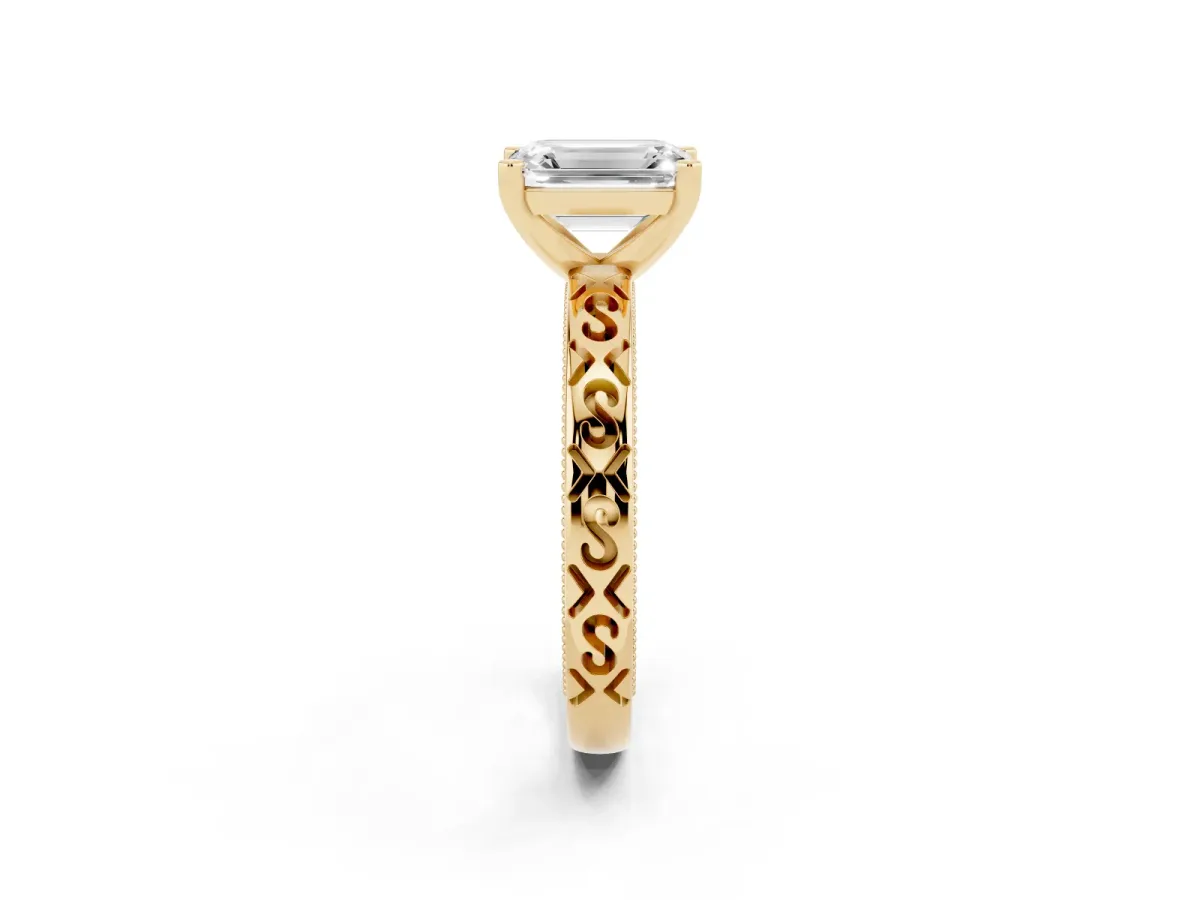 Emerald Cut Solitaire Engagement Ring with Scrollwork Band and Four-Prong Setting Yellow gold