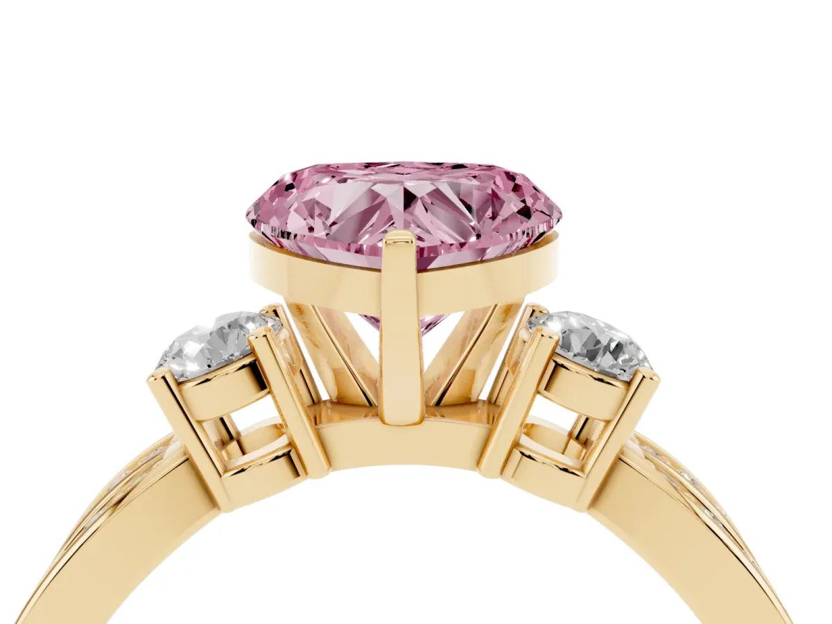 Fancy Pink Three-Stone Heart Cut Cut Diamond Twist Band with Prong Setting Yellow gold