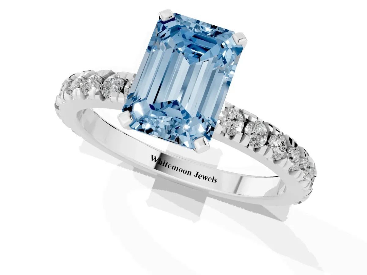 Fancy Blue Emerald Cut Diamond Pavé Band Solitaire with Four-Prong Setting Silver