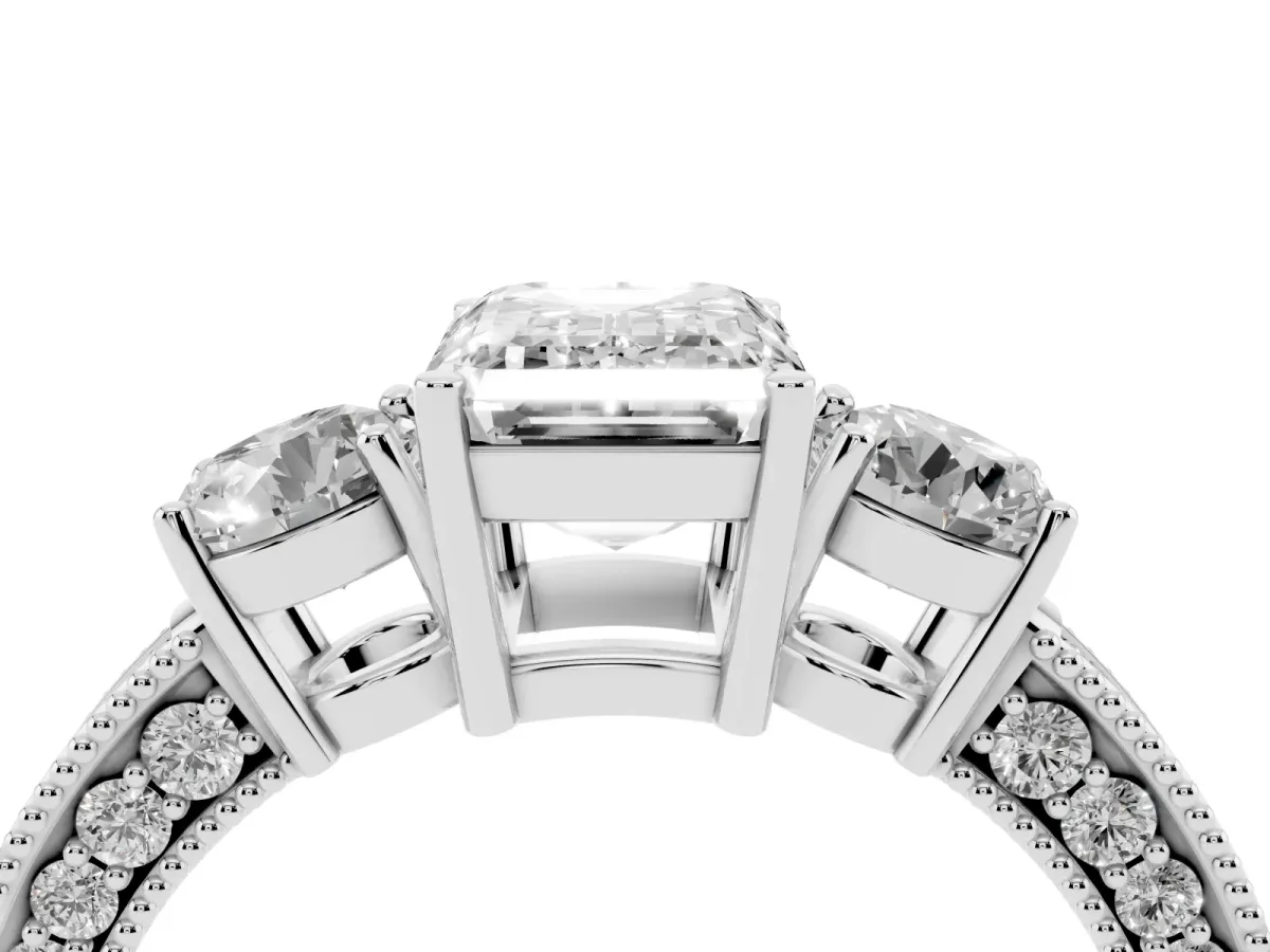 Emerald Cut Three-Stone Diamond Ring with Pavé Band and Four-Prong Setting Silver