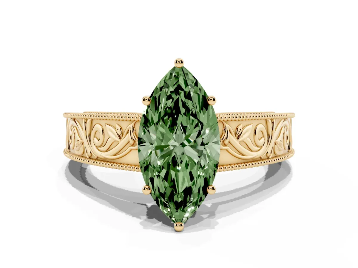 Fancy Green Marquise Cut Diamond Solitaire Ring with Engraved Band and Four-Prong Setting Yellow gold