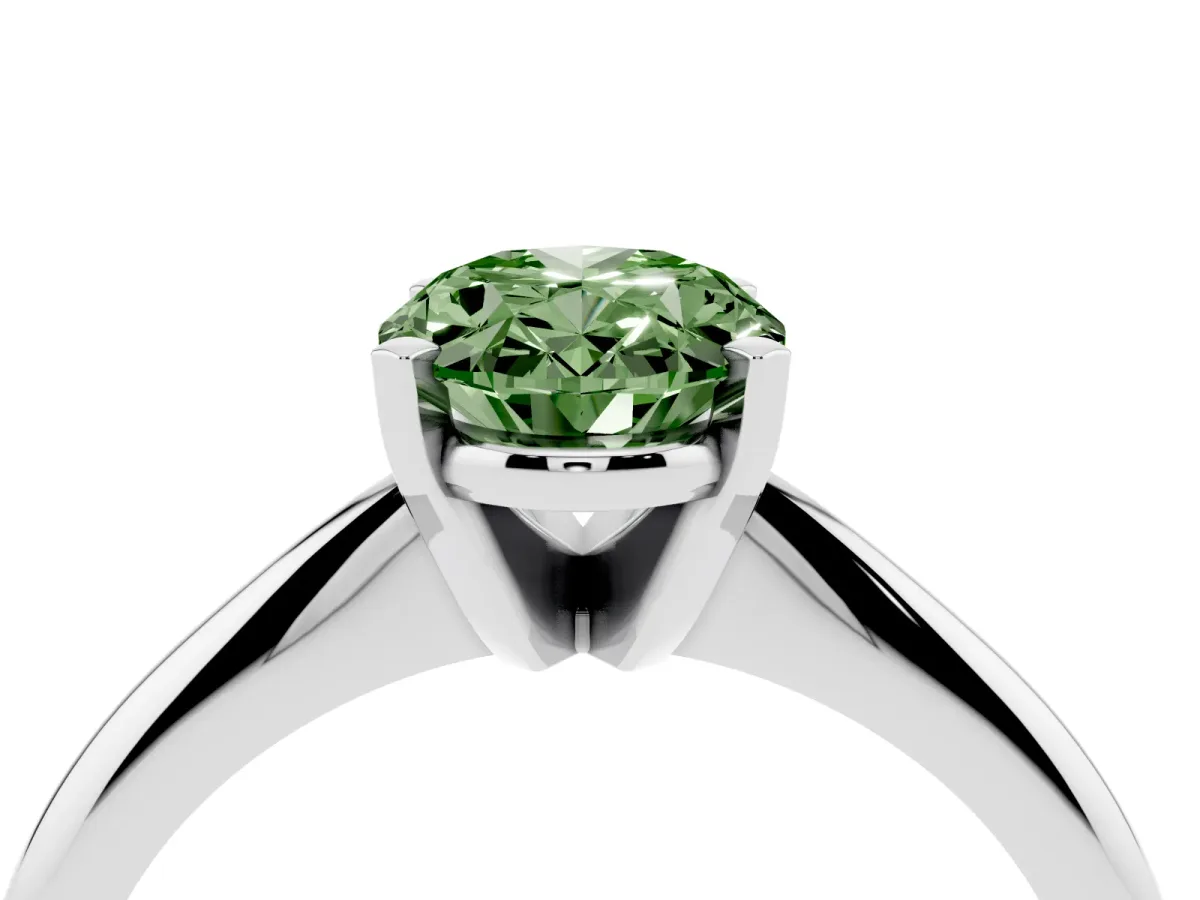 Fancy Green Oval Cut Cut Solitaire Ring with Four-Prong Setting on a Classic Band Silver