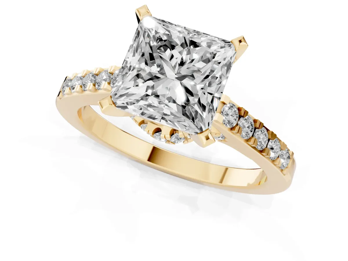 Princess Cut Diamond Solitaire Ring with Crossover Gallery and Round Pavé Band Yellow gold