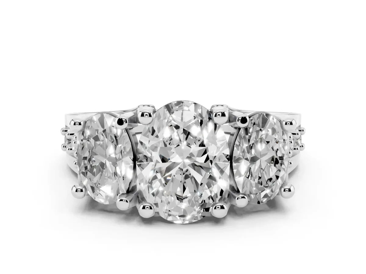 Oval Cut Diamond Three-Stone Ring with Channel Set Band and Four-Prong Setting Silver