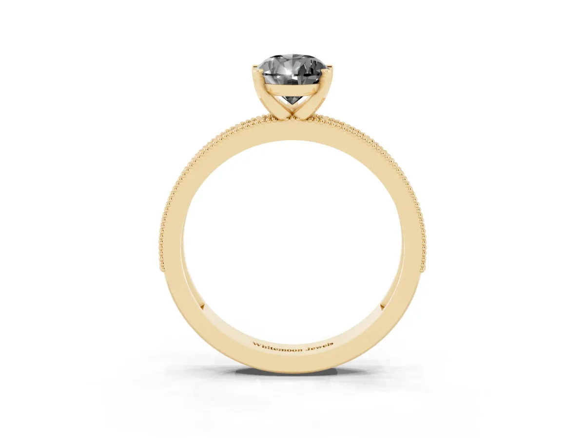 Fancy Black Pear Cut Diamond Milgrain Pavé Engagement Ring with Four-Prong Setting Yellow gold