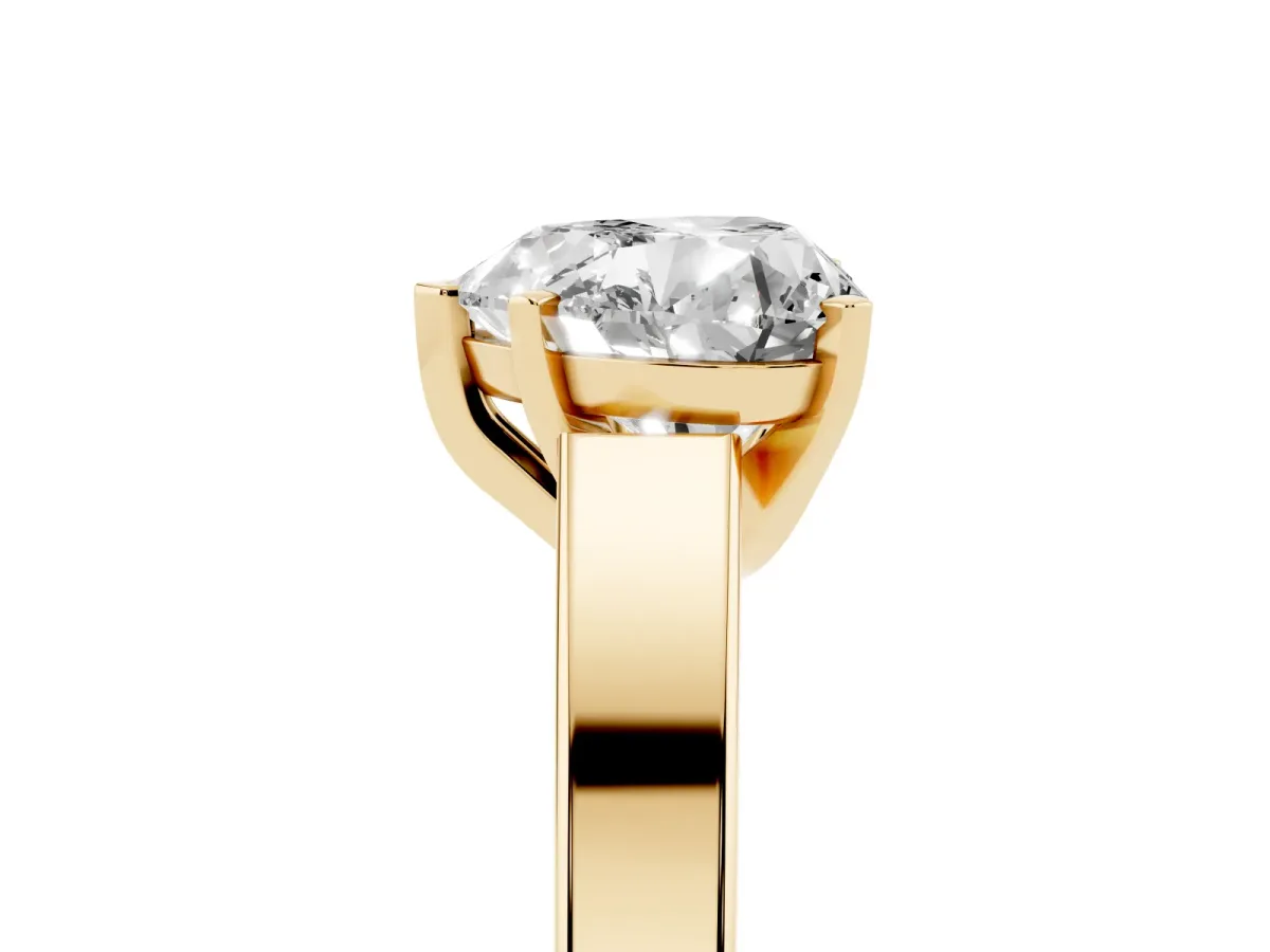 Heart Cut Solitaire Engagement Ring with Four-Prong Setting and Tapered Band Yellow gold