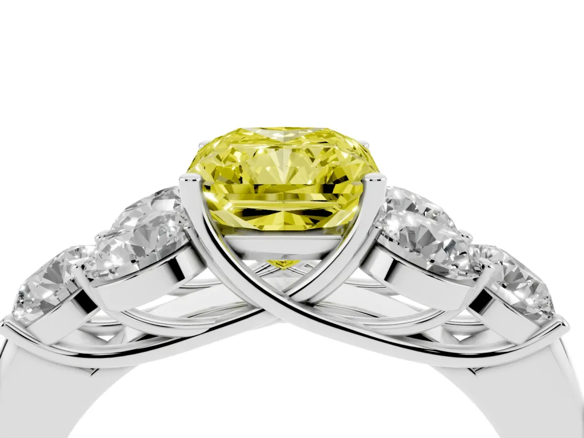 Fancy Yellow Radiant Cut Cut Diamond Cluster Ring with Round Accent Stones and Prong Setting on a Classic Band Platinum