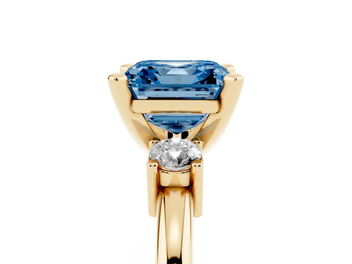 Fancy Blue Three-Stone Asscher Cut Cut Diamond Solitaire with Prong Setting and Classic Band Yellow gold