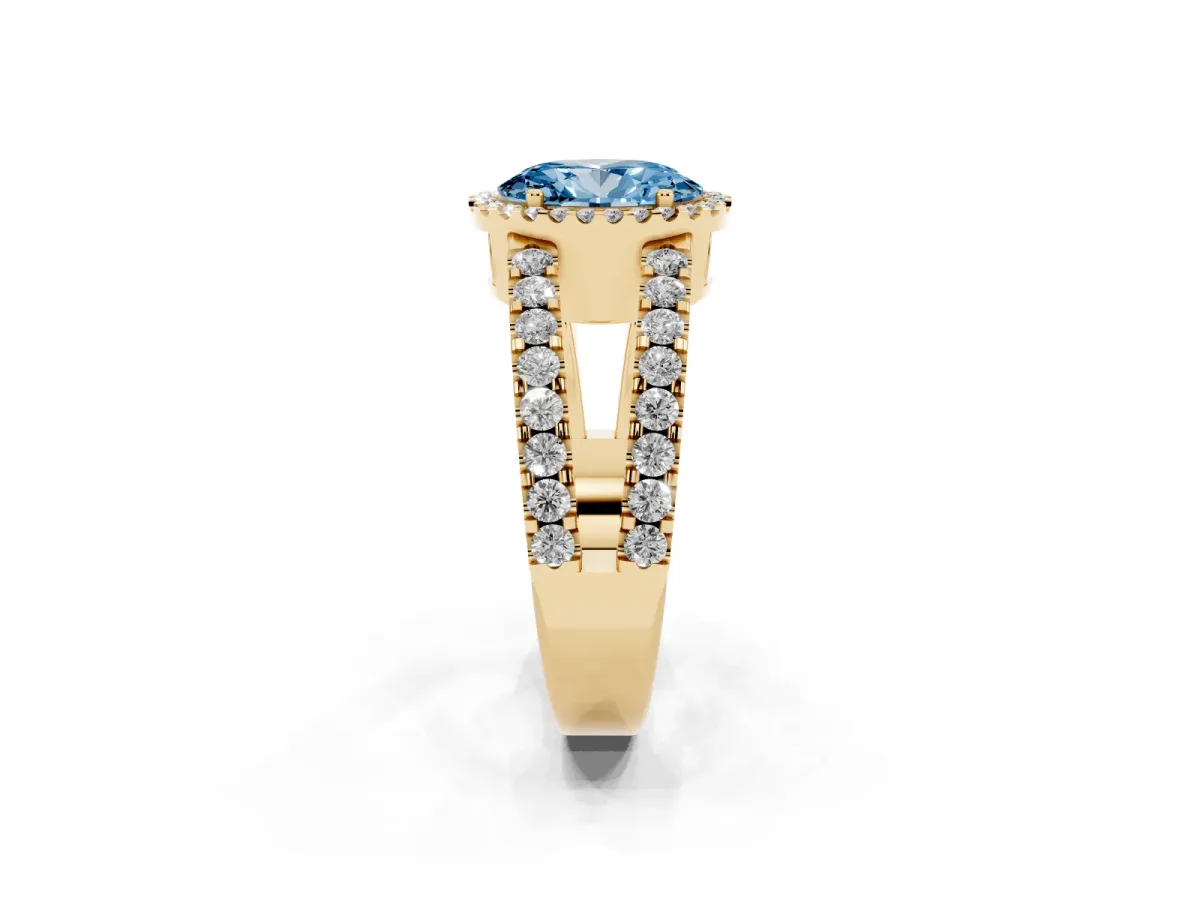Fancy Blue Oval Cut Cut Halo Split Shank Diamond Ring with Four-Prong Setting Yellow gold
