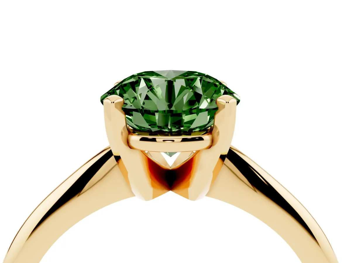 Fancy Green Round Cut Cut Solitaire Ring with Four-Prong Setting on a Classic Band Yellow gold
