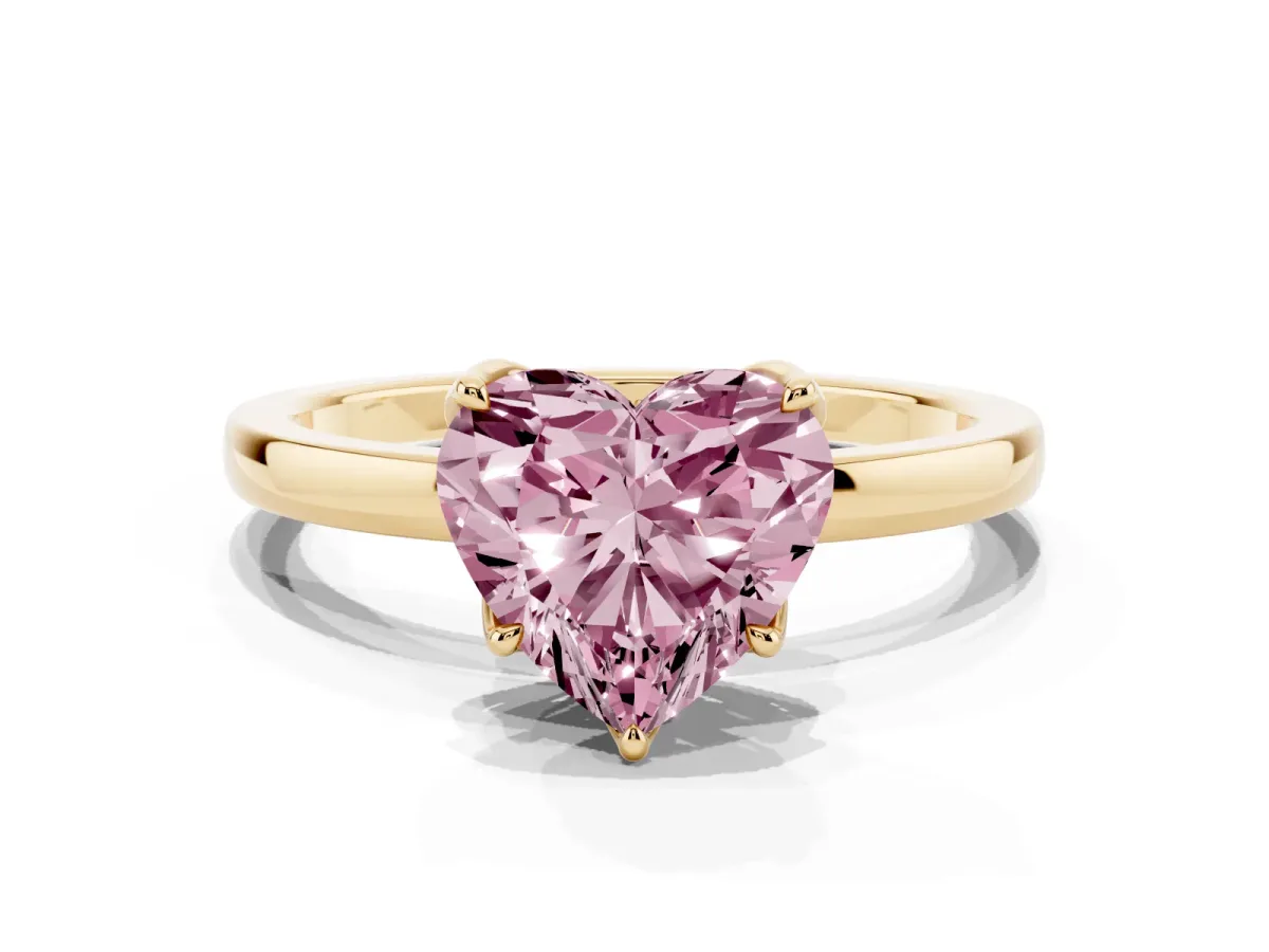 Fancy Pink Heart Cut Diamond Solitaire Ring with Thin Band and Prong Setting Yellow gold