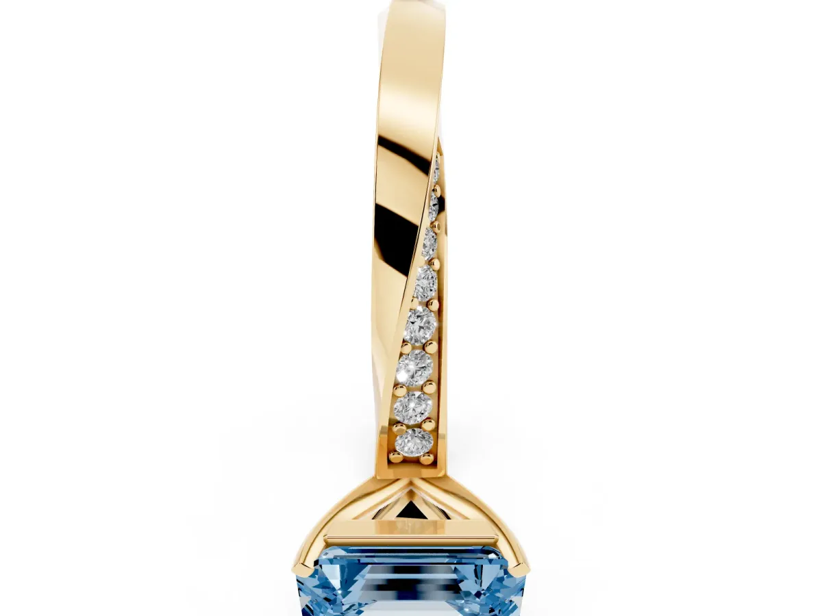 Fancy Blue Emerald Cut Diamond Engagement Ring with Side Stone Accents and Four-Prong Setting Yellow gold