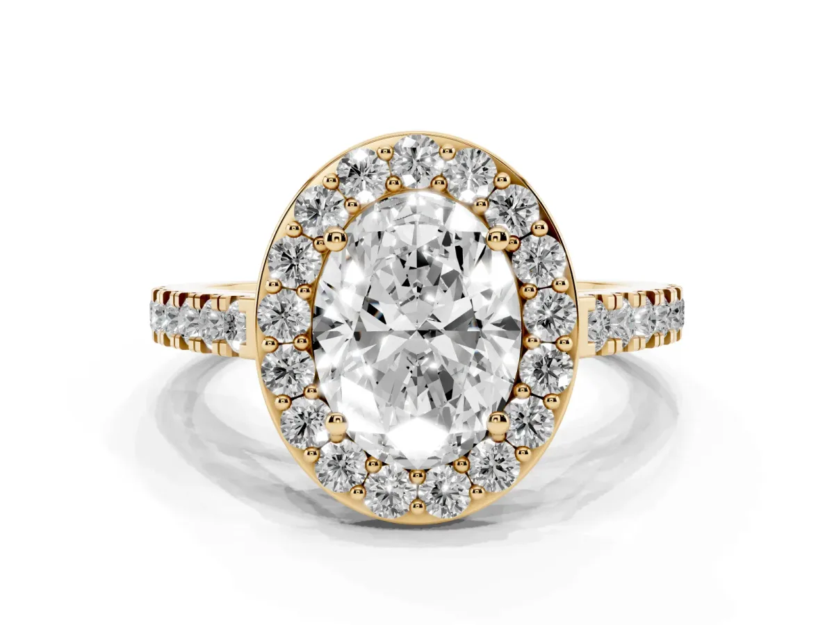 Oval Cut Diamond Halo Ring with Round Pavé Split Shank and Prong Setting Yellow gold