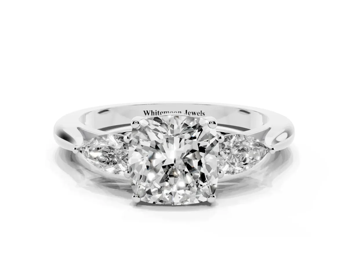 Three-Stone Cushion Cut Diamond Ring with Pear Side Stones in Four-Prong Setting Silver