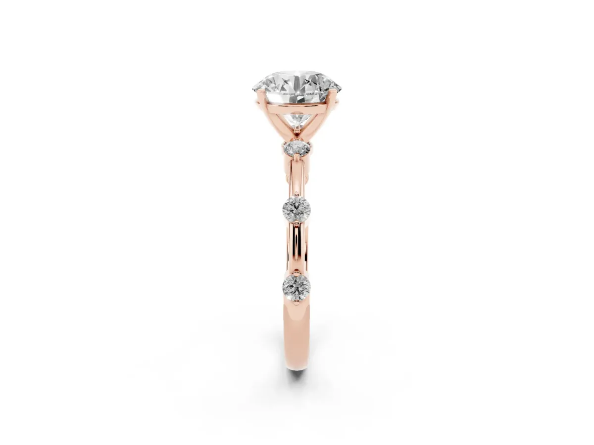 Round Cut Solitaire Diamond Ring with Bezel Set Side Stones and Prong Setting Rose gold
