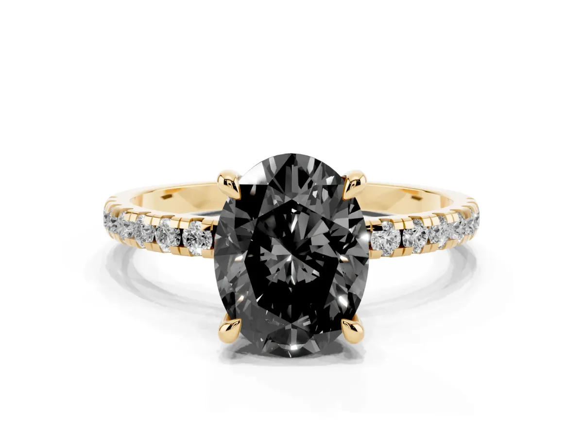 Fancy Black Oval Cut Diamond Brilliant Solitaire Ring with Pavé Band and Four-Prong Setting Yellow gold