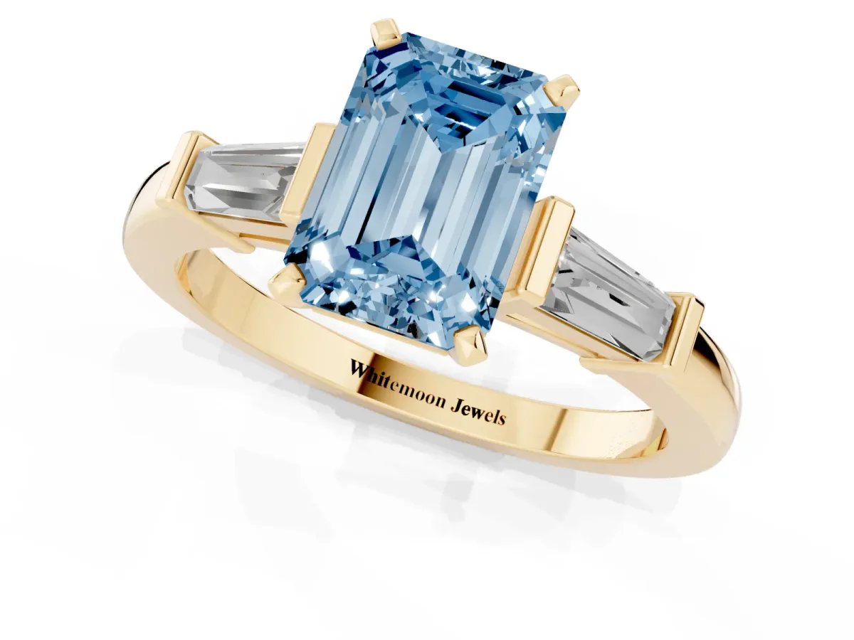 Fancy Blue Emerald Cut Cut Diamond Solitaire Ring with Tapered Baguette Accents and Four-Prong Setting Yellow gold