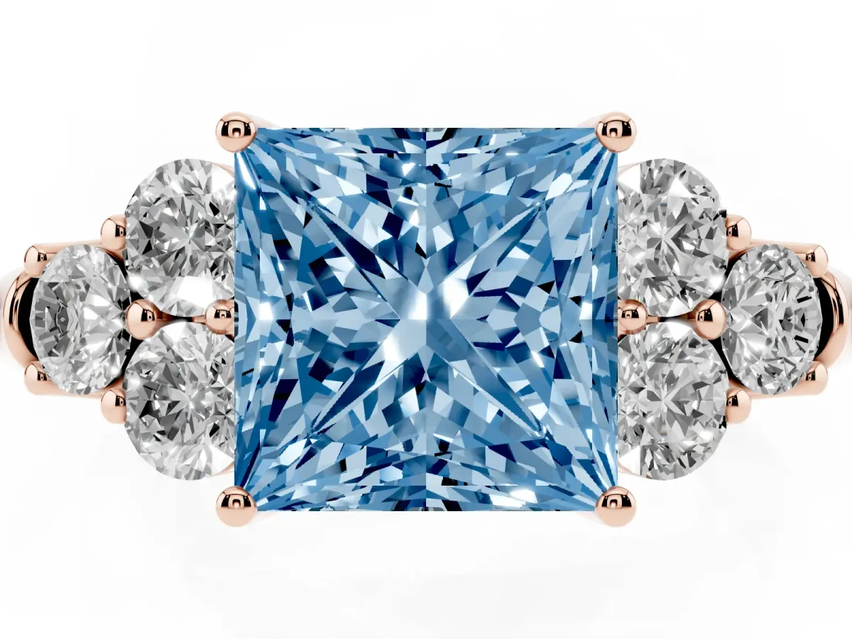 Fancy Blue Princess Cut Cut Diamond Cluster Ring with Round Accent Stones and Prong Setting on a Classic Band Rose gold