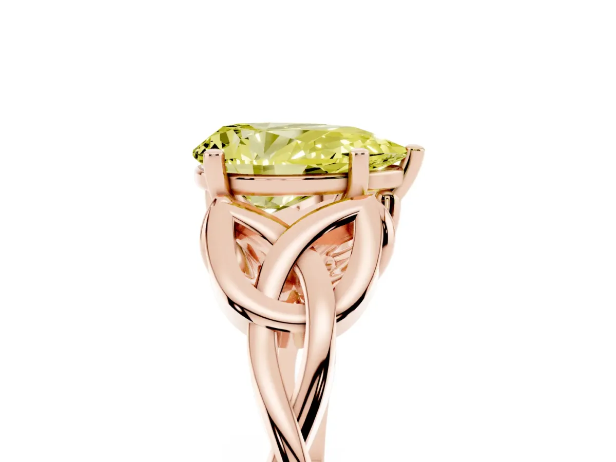 Fancy Yellow Pear Cut Diamond Solitaire Engagement Ring with Celtic Knot Band and Four-Prong Setting Rose gold