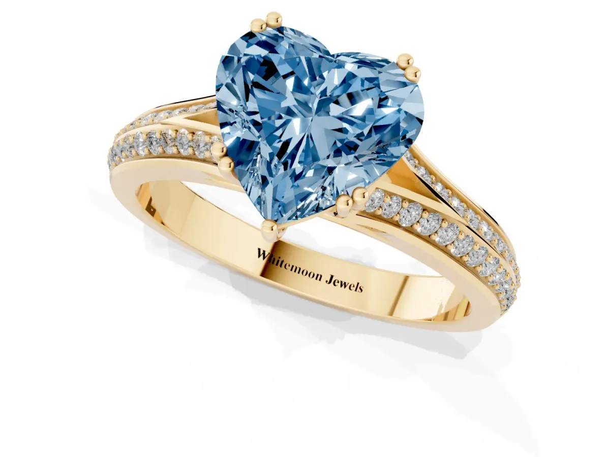Fancy Blue Heart Cut Diamond Split Shank Engagement Ring with Pavé Band Yellow gold