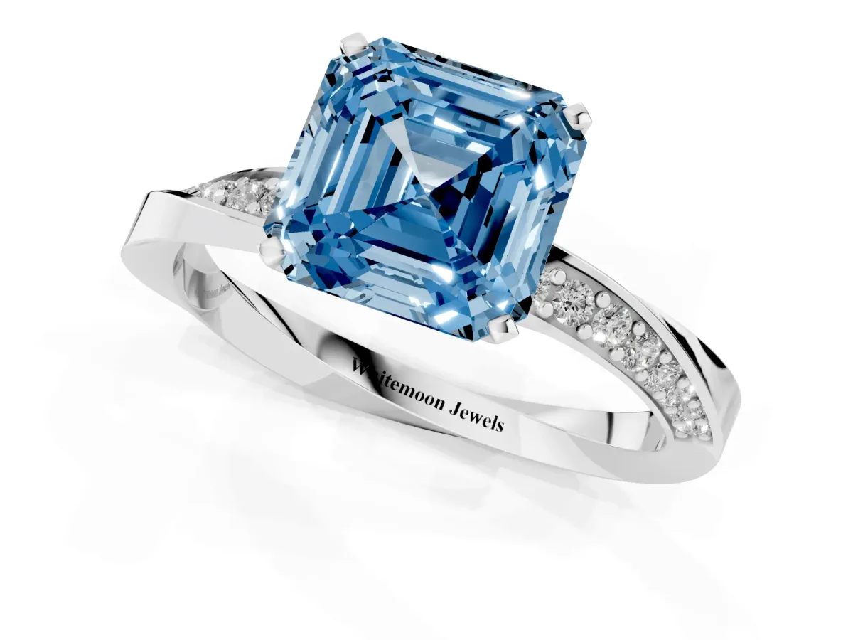 Fancy Blue Asscher Cut Diamond Engagement Ring with Side Stone Accents and Four-Prong Setting Silver