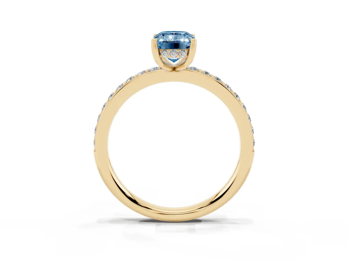 Fancy Blue Emerald Cut Cut Diamond Pavé Band Ring with Four-Prong Setting Yellow gold