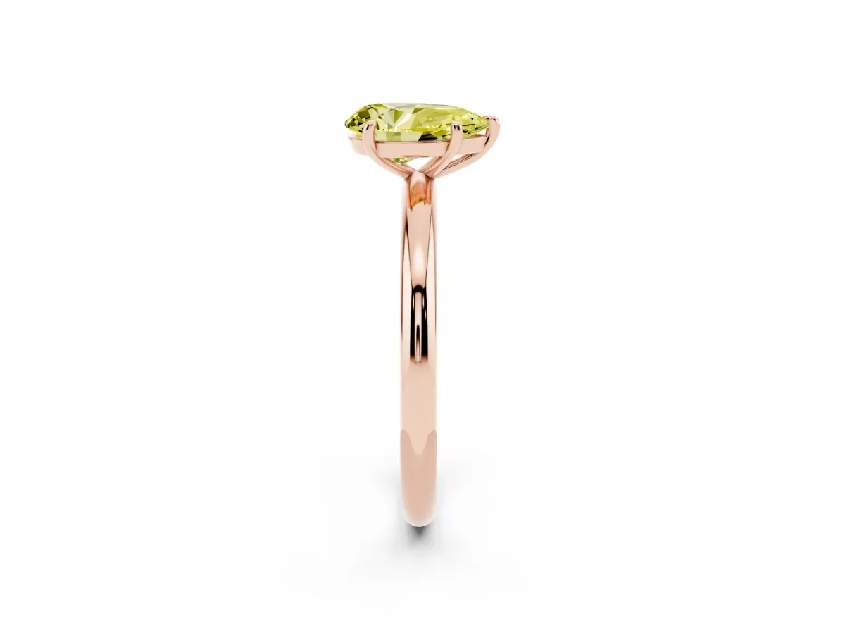 Fancy Yellow Pear Cut Solitaire Diamond Ring with Four-Prong Setting on a Plain Band Rose gold