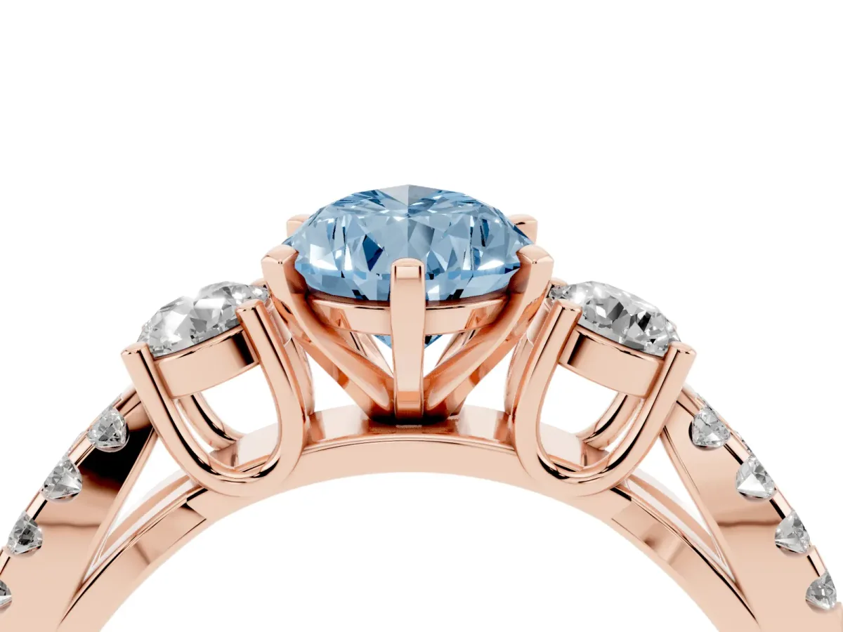 Fancy Blue Pear Cut Diamond Three-Stone Ring with Pavé Split Shank and Four-Prong Setting Rose gold