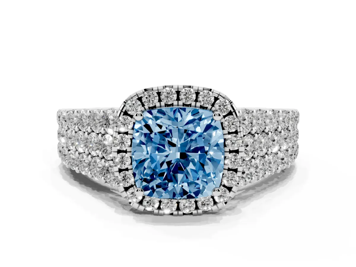 Fancy Blue Cushion Cut Diamond Halo Engagement Ring with Triple Row Round Pavé Band and Prong Setting Silver