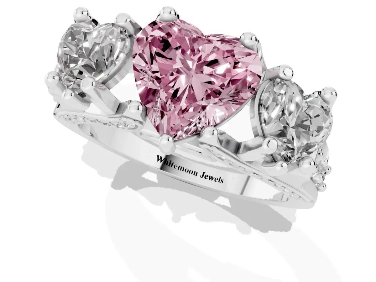 Fancy Pink Heart Cut Diamond Three-Stone Ring with Channel Set Band and Four-Prong Setting Silver