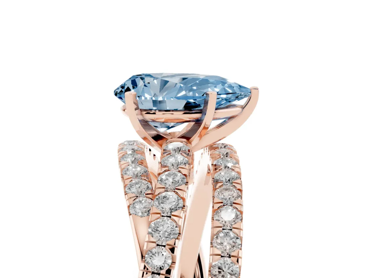 Fancy Blue Pear Cut Solitaire Twist Band with Pavé Setting and Four-Prong Setting Rose gold