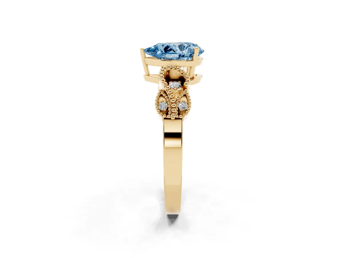 Fancy Blue Pear Cut Solitaire Milgrain Leaf Band with Prong Setting Yellow gold