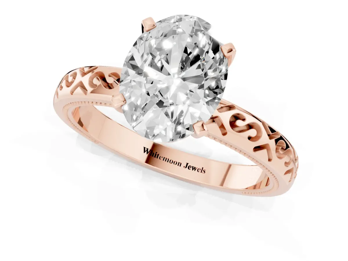 Oval Cut Solitaire Engagement Ring with Scrollwork Band and Four-Prong Setting Rose gold